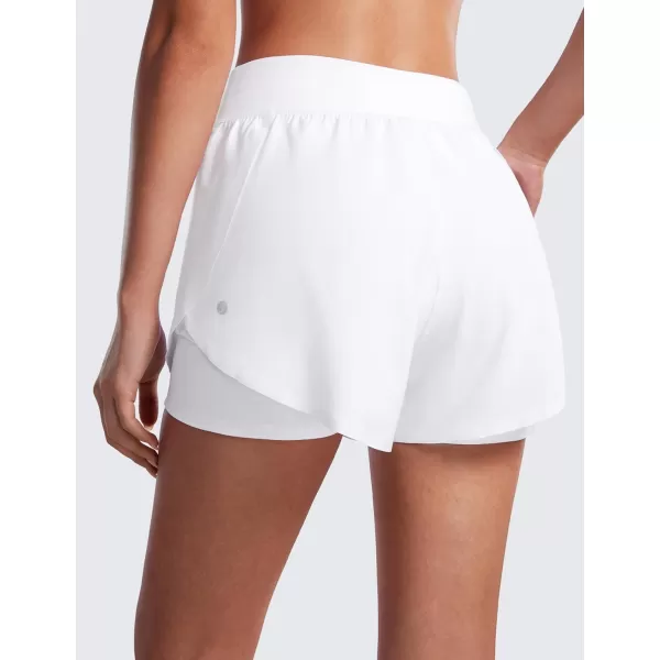 CRZ YOGA 2 in 1 Dolphin Running Shorts for Women High Waisted Gym Workot Athletic Tennis Shorts with Pockets SplitWhite