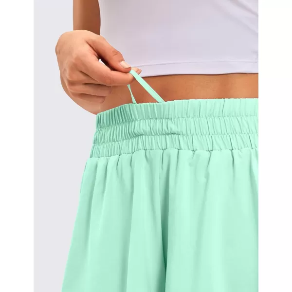 CRZ YOGA 2 in 1 Flowy Running Shorts for Women High Waisted Quick Dry Athletic Gym Lounge Workout Shorts Cute Tennis SkirtsMint Moment