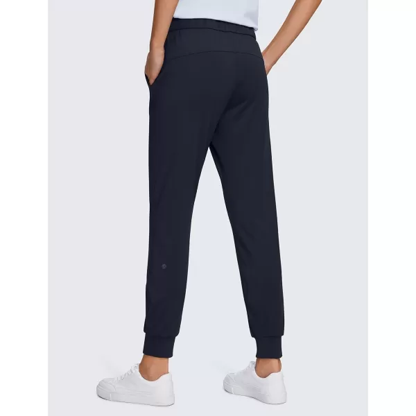 CRZ YOGA 4Way Stretch Golf Joggers for Women 27 Casual Travel Workout Pants Lounge Athletic Sweatpants with PocketsNavy