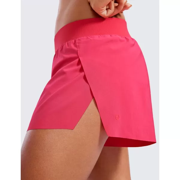 CRZ YOGA Athletic Running Shorts for Women V Split Low Waisted Lightweight Gym Workout Athletic Shorts with LinerLip Gloss Pink