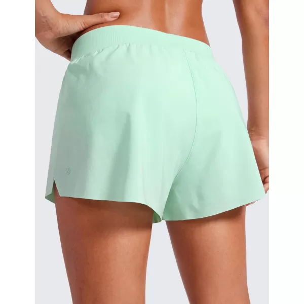 CRZ YOGA Athletic Running Shorts for Women V Split Low Waisted Lightweight Gym Workout Athletic Shorts with LinerMint Moment