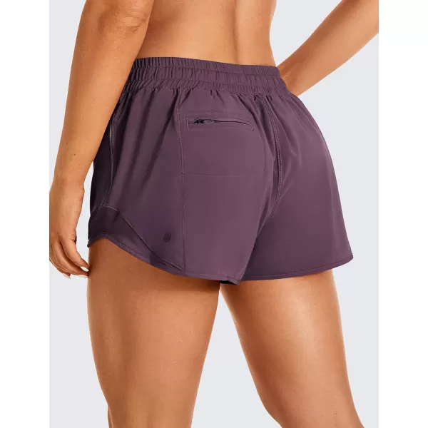 CRZ YOGA Athletic Shorts for Women with Zip Pocket 254 Mid Waist Mesh Liner Shorts for Running Gym WorkoutArctic Plum