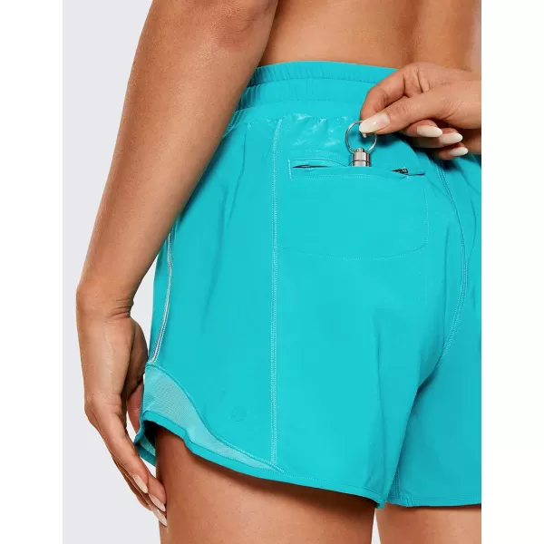 CRZ YOGA Athletic Shorts for Women with Zip Pocket 254 Mid Waist Mesh Liner Shorts for Running Gym WorkoutHoliday Blue