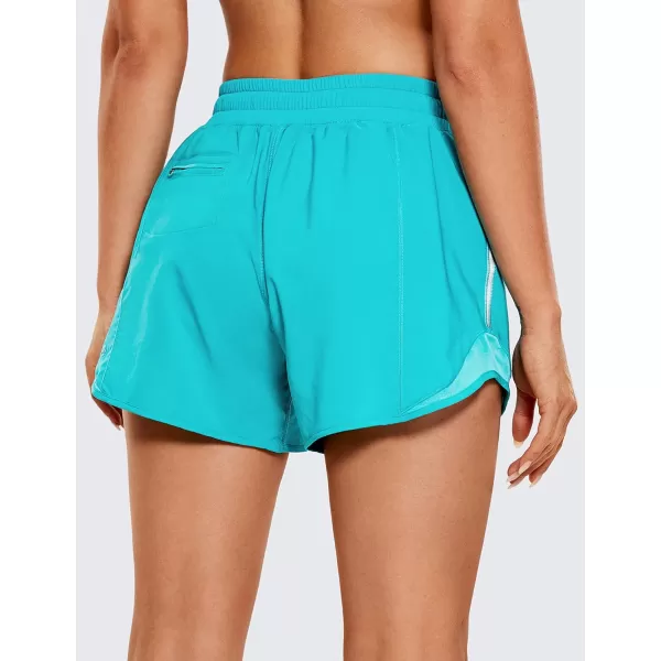 CRZ YOGA Athletic Shorts for Women with Zip Pocket 254 Mid Waist Mesh Liner Shorts for Running Gym WorkoutHoliday Blue