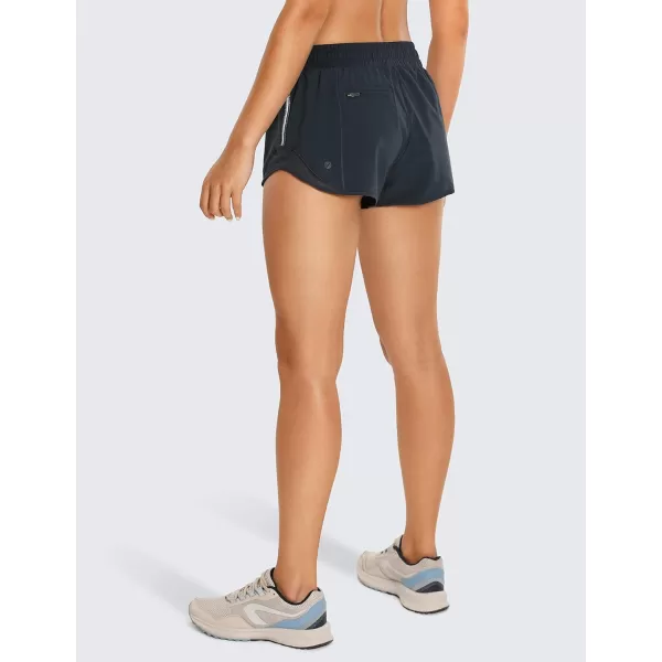 CRZ YOGA Athletic Shorts for Women with Zip Pocket 254 Mid Waist Mesh Liner Shorts for Running Gym WorkoutInk Blue