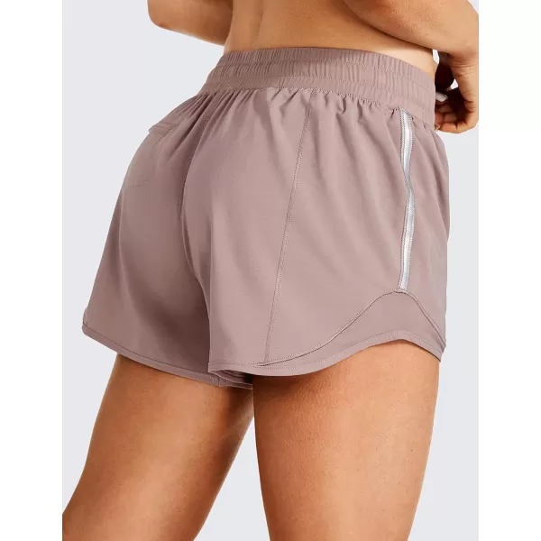 CRZ YOGA Athletic Shorts for Women with Zip Pocket 254 Mid Waist Mesh Liner Shorts for Running Gym WorkoutMineral Brown