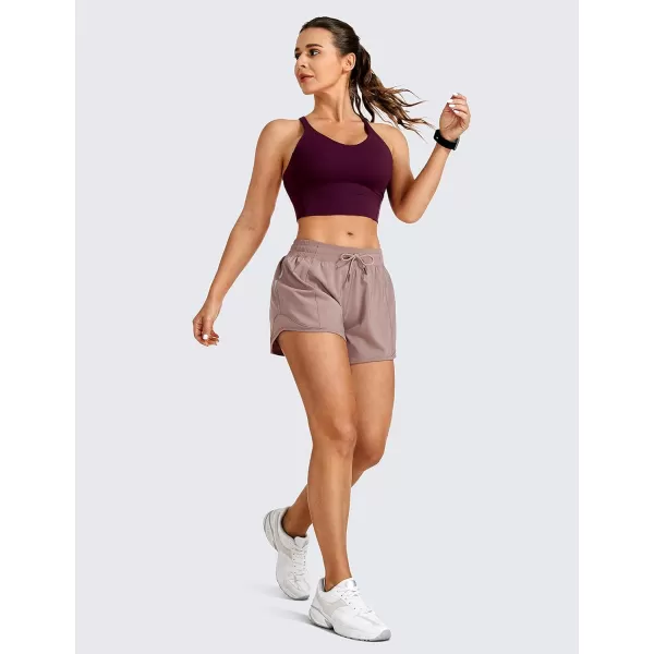 CRZ YOGA Athletic Shorts for Women with Zip Pocket 254 Mid Waist Mesh Liner Shorts for Running Gym WorkoutMineral Brown