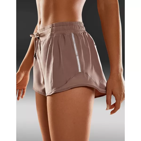 CRZ YOGA Athletic Shorts for Women with Zip Pocket 254 Mid Waist Mesh Liner Shorts for Running Gym WorkoutMineral Brown