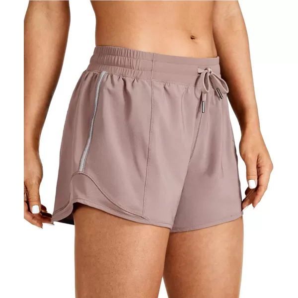 CRZ YOGA Athletic Shorts for Women with Zip Pocket 254 Mid Waist Mesh Liner Shorts for Running Gym WorkoutMineral Brown