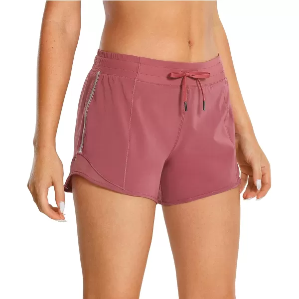 CRZ YOGA Athletic Shorts for Women with Zip Pocket 254 Mid Waist Mesh Liner Shorts for Running Gym WorkoutMisty Merlot