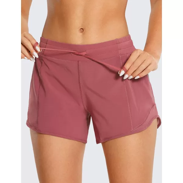 CRZ YOGA Athletic Shorts for Women with Zip Pocket 254 Mid Waist Mesh Liner Shorts for Running Gym WorkoutMisty Merlot