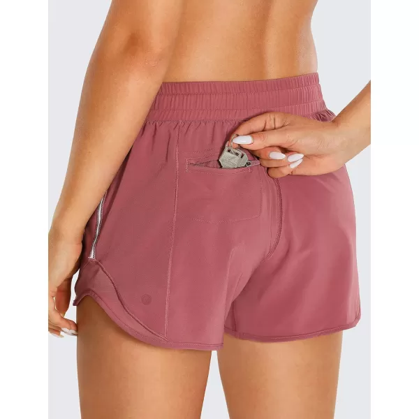 CRZ YOGA Athletic Shorts for Women with Zip Pocket 254 Mid Waist Mesh Liner Shorts for Running Gym WorkoutMisty Merlot