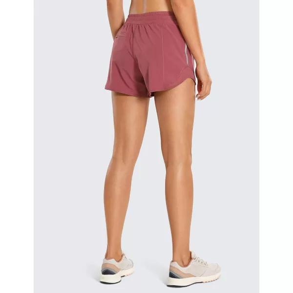 CRZ YOGA Athletic Shorts for Women with Zip Pocket 254 Mid Waist Mesh Liner Shorts for Running Gym WorkoutMisty Merlot