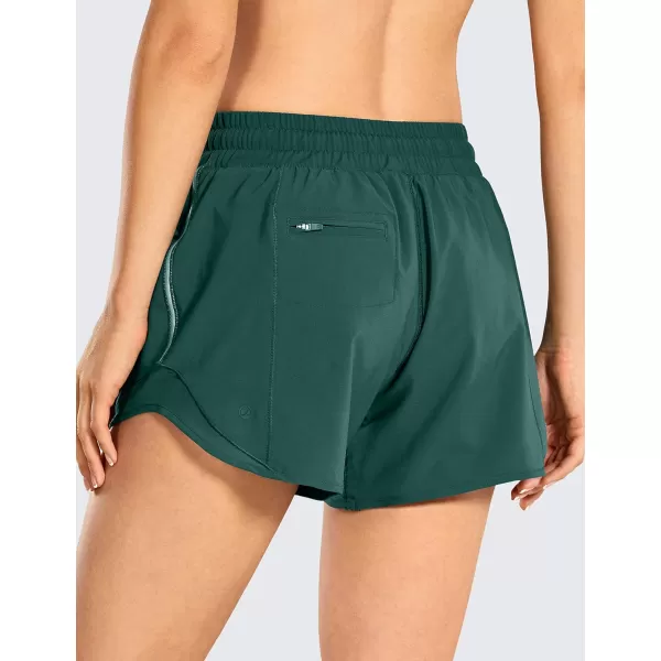 CRZ YOGA Athletic Shorts for Women with Zip Pocket 254 Mid Waist Mesh Liner Shorts for Running Gym WorkoutMoss Green