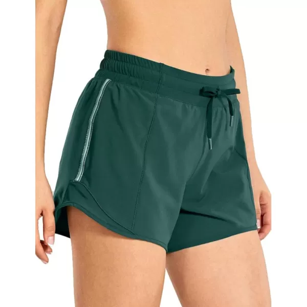 CRZ YOGA Athletic Shorts for Women with Zip Pocket 254 Mid Waist Mesh Liner Shorts for Running Gym WorkoutMoss Green