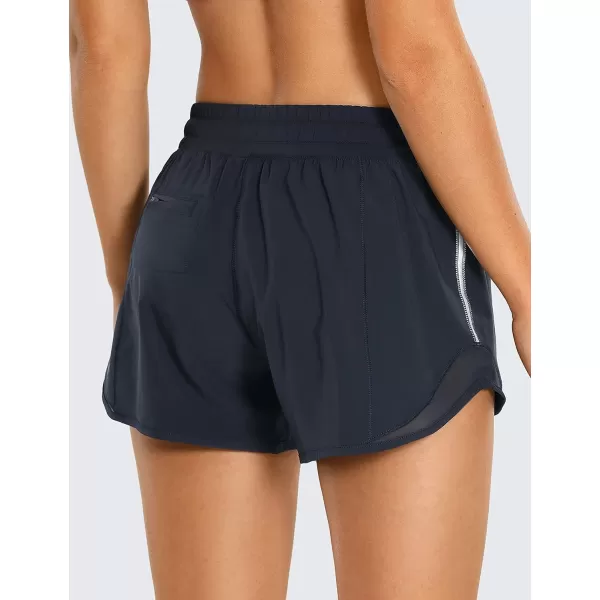 CRZ YOGA Athletic Shorts for Women with Zip Pocket 254 Mid Waist Mesh Liner Shorts for Running Gym WorkoutNavy