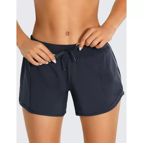 CRZ YOGA Athletic Shorts for Women with Zip Pocket 254 Mid Waist Mesh Liner Shorts for Running Gym WorkoutNavy