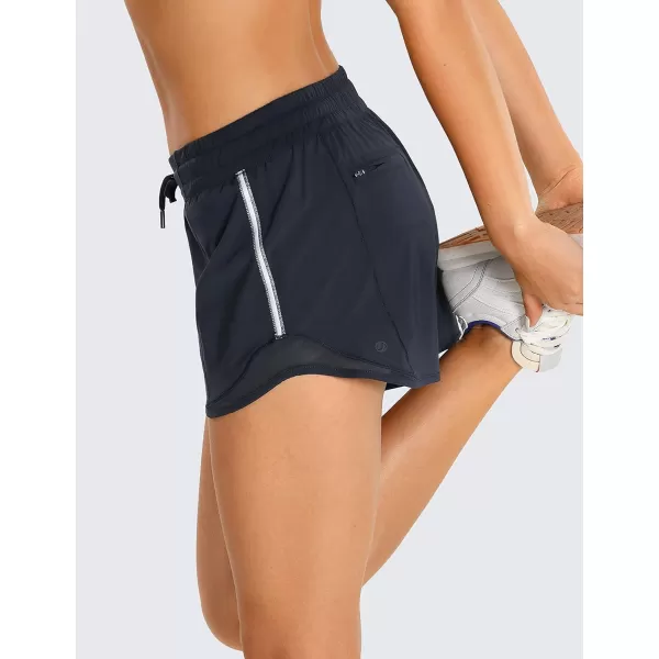 CRZ YOGA Athletic Shorts for Women with Zip Pocket 254 Mid Waist Mesh Liner Shorts for Running Gym WorkoutNavy