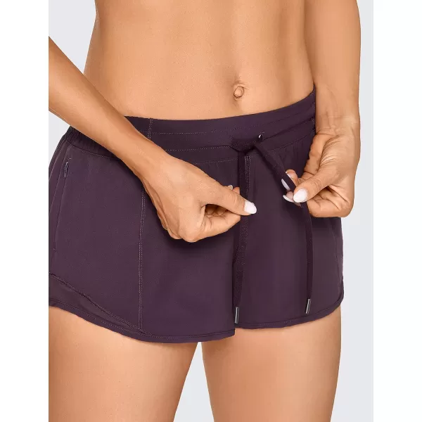 CRZ YOGA Athletic Shorts for Women with Zip Pocket 254 Mid Waist Mesh Liner Shorts for Running Gym WorkoutNewarctic Plum