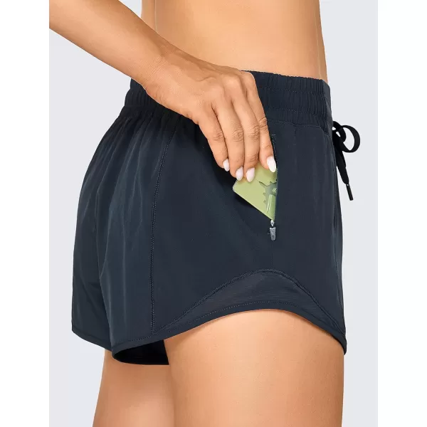 CRZ YOGA Athletic Shorts for Women with Zip Pocket 254 Mid Waist Mesh Liner Shorts for Running Gym WorkoutNewstelindigo
