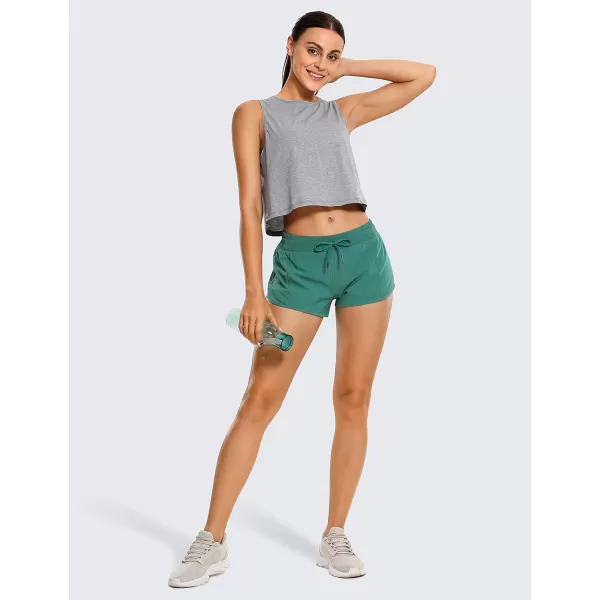 CRZ YOGA Athletic Shorts for Women with Zip Pocket 254 Mid Waist Mesh Liner Shorts for Running Gym WorkoutSmoky Green