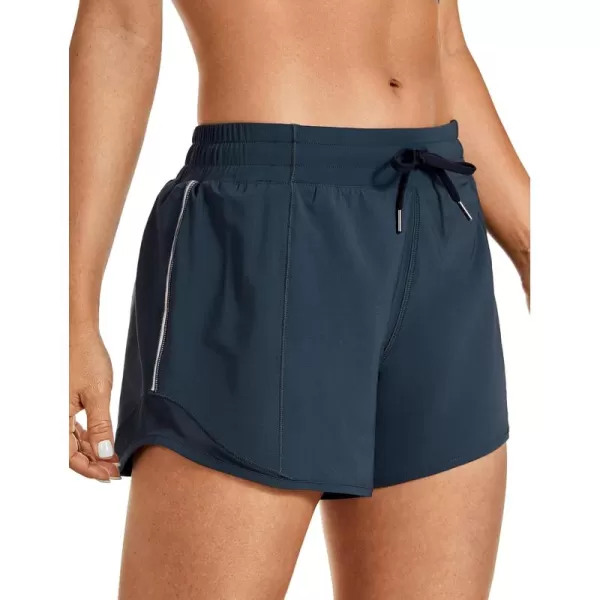 CRZ YOGA Athletic Shorts for Women with Zip Pocket 254 Mid Waist Mesh Liner Shorts for Running Gym WorkoutStelindigo