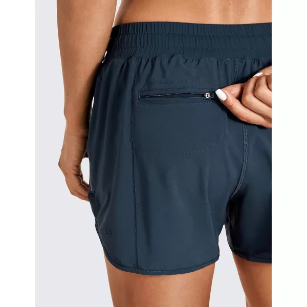 CRZ YOGA Athletic Shorts for Women with Zip Pocket 254 Mid Waist Mesh Liner Shorts for Running Gym WorkoutStelindigo