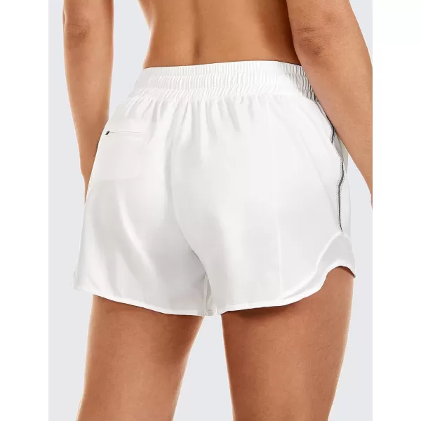 CRZ YOGA Athletic Shorts for Women with Zip Pocket 254 Mid Waist Mesh Liner Shorts for Running Gym WorkoutWhite