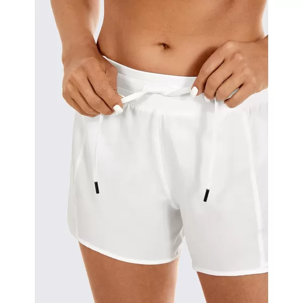 CRZ YOGA Athletic Shorts for Women with Zip Pocket 254 Mid Waist Mesh Liner Shorts for Running Gym WorkoutWhite