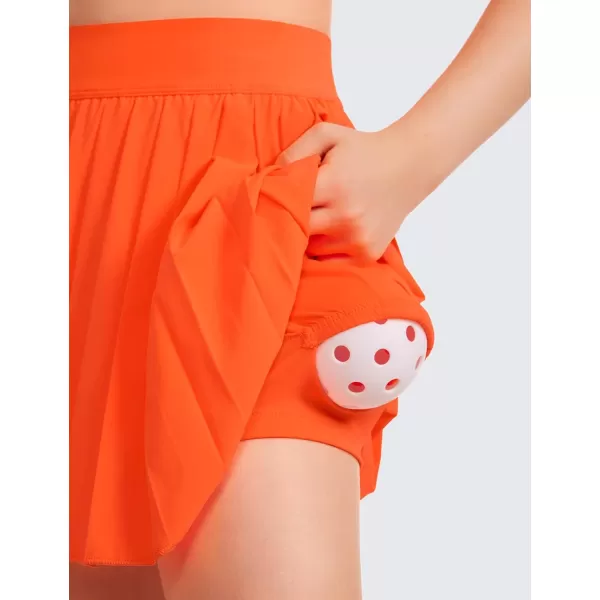 CRZ YOGA Girls Pleated Skirt with Shorts Tennis Athletic School Kids Teen Skorts with PocketsNeon Orange