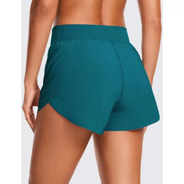 CRZ YOGA High Waisted Dolphin Athletic Running Shorts for Women High Split Comfy Mesh Liner Gym Workout Track ShortsBorealis Green