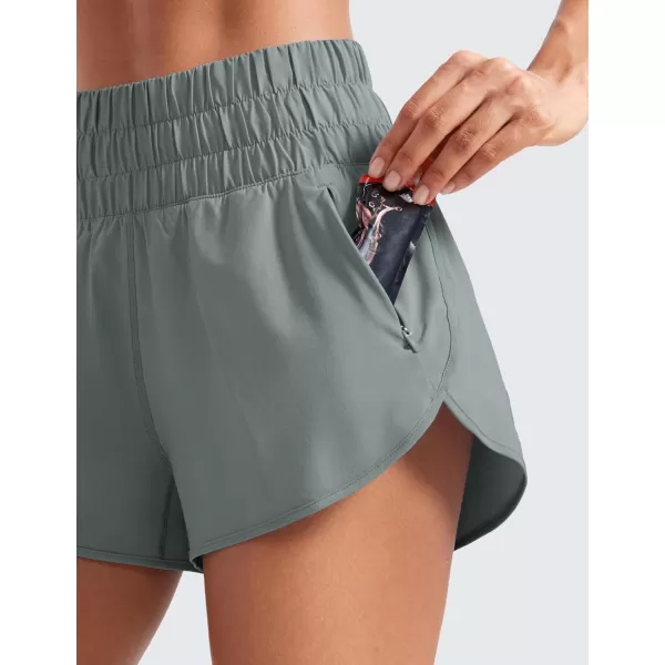 CRZ YOGA High Waisted Dolphin Running Shorts for Womens Mesh Liner Gym Workout Athletic Shorts with Zipper PocketGrey Sage