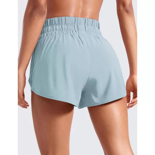 CRZ YOGA High Waisted Dolphin Running Shorts for Womens Mesh Liner Gym Workout Athletic Shorts with Zipper PocketLight Grayish Blue