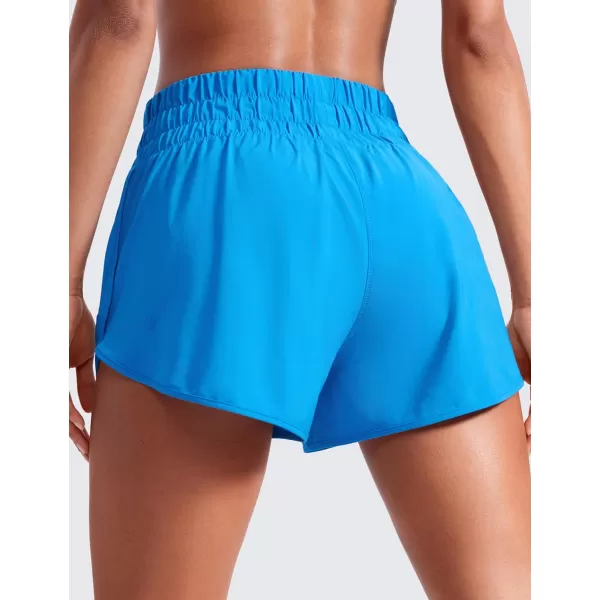 CRZ YOGA High Waisted Dolphin Running Shorts for Womens Mesh Liner Gym Workout Athletic Shorts with Zipper PocketMadagascar Blue