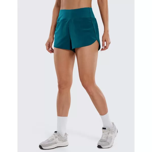 CRZ YOGA High Waisted Running Shorts for Women  254 Liner Gym Athletic Workout Shorts with Pockets Soft LightweightBorealis Green