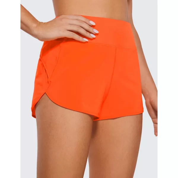 CRZ YOGA High Waisted Running Shorts for Women  254 Liner Gym Athletic Workout Shorts with Pockets Soft LightweightClassic Fit 25  High Waisted Neon Orange