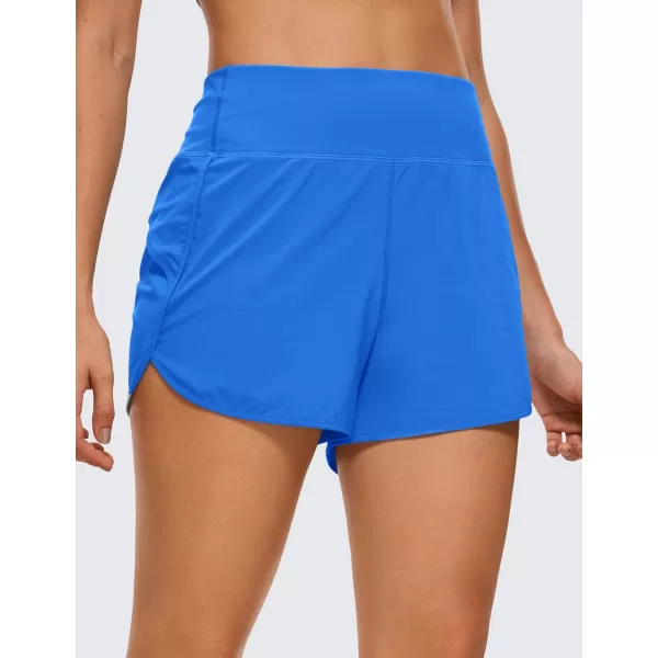 CRZ YOGA High Waisted Running Shorts for Women  254 Liner Gym Athletic Workout Shorts with Pockets Soft LightweightClassic Fit 4  High Waisted Sparkle Blue