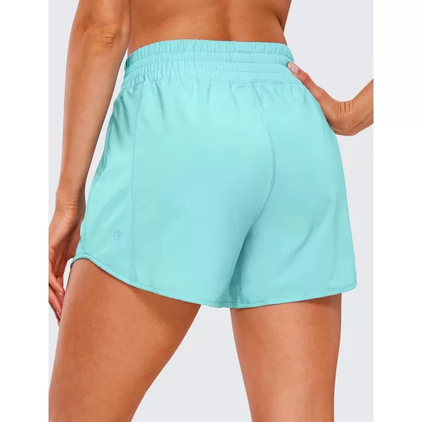 CRZ YOGA High Waisted Workout Shorts for Women  4 Linerless Quick Dry Track Gym Athletic Running Shorts with Zip PocketTurquoise