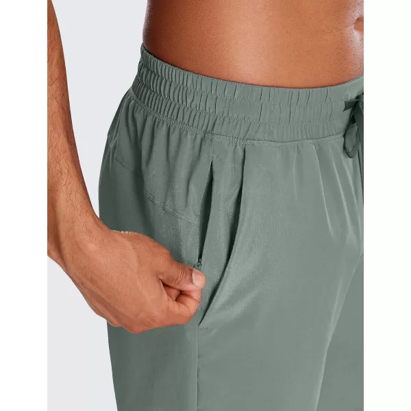 CRZ YOGA Mens 2 in 1 Running Shorts with Liner  5 7 9 Quick Dry Workout Sports Athletic Shorts with PocketsGrey Sage