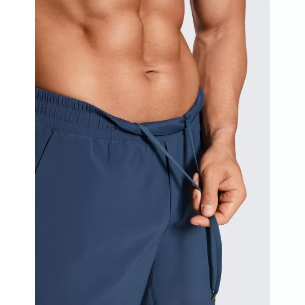 CRZ YOGA Mens 2 in 1 Running Shorts with Liner  7 Quick Dry Workout Sports Athletic Shorts with PocketsElectric Blue