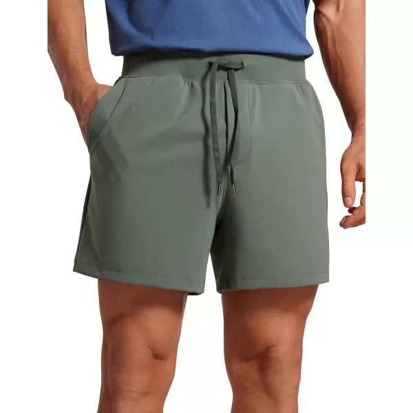 CRZ YOGA Mens FourWay Stretch Workout Shorts  579 Soft Durable Casual Athletic Shorts with Pocket Gym Running HikingKhaki Sand