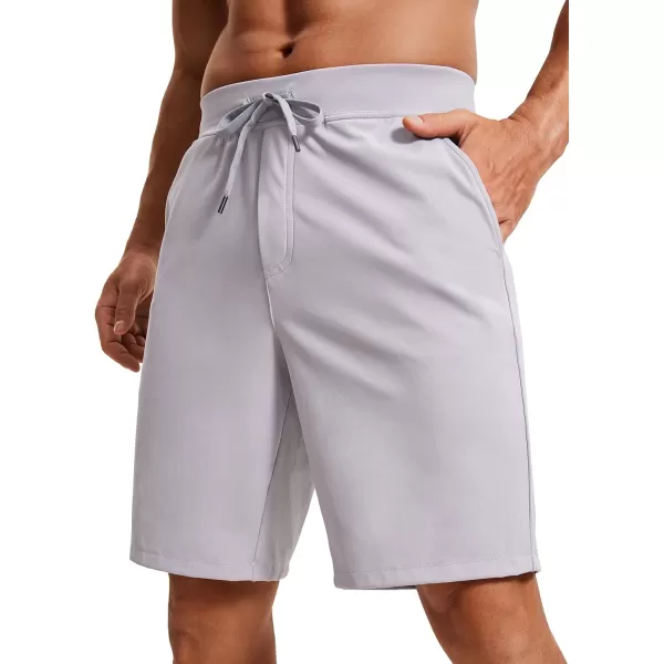 CRZ YOGA Mens FourWay Stretch Workout Shorts  79 Soft Durable Casual Athletic Shorts with Pockets Gym Running HikingKhaki Sand
