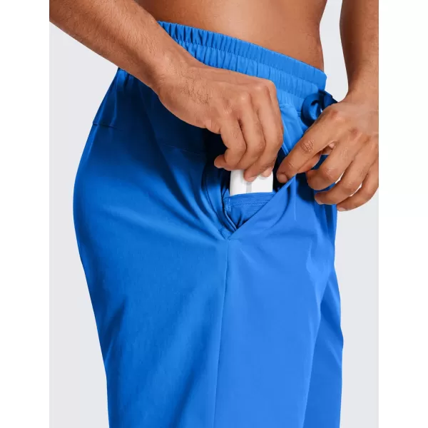 CRZ YOGA Mens Linerless Workout Shorts  7 Quick Dry Running Sports Athletic Gym Shorts with PocketsSparkle Blue