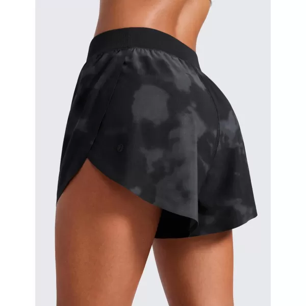 CRZ YOGA Mid Waisted Dolphin Athletic Shorts for Women Lightweight High Split Gym Workout Shorts with Liner Quick DryBlack Tie Dye Flowers