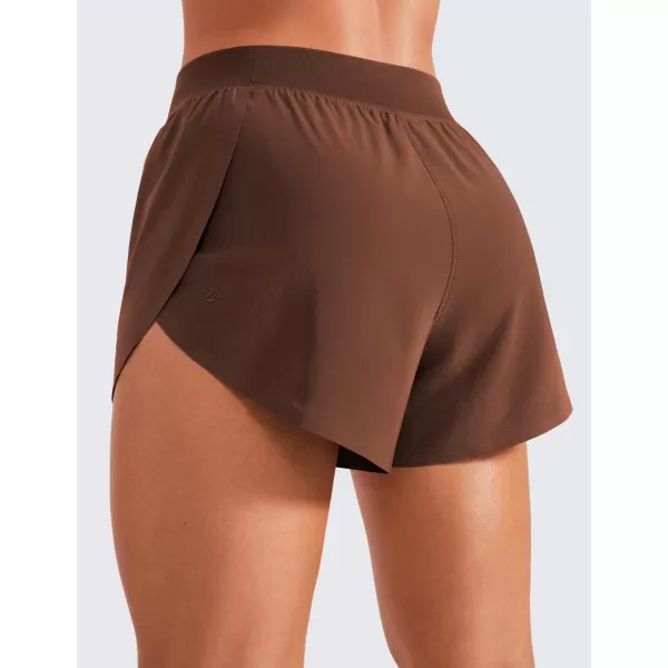 CRZ YOGA Mid Waisted Dolphin Athletic Shorts for Women Lightweight High Split Gym Workout Shorts with Liner Quick DryCoffee Brown