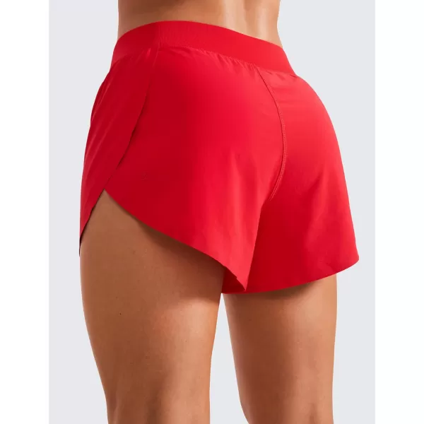 CRZ YOGA Mid Waisted Dolphin Athletic Shorts for Women Lightweight High Split Gym Workout Shorts with Liner Quick DryDeep Red