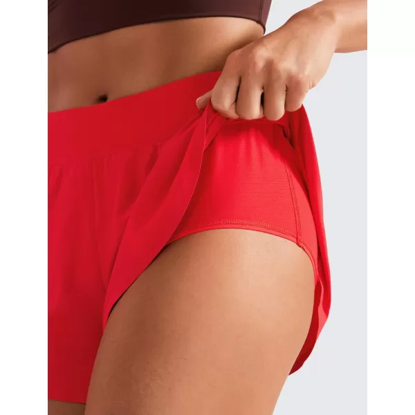 CRZ YOGA Mid Waisted Dolphin Athletic Shorts for Women Lightweight High Split Gym Workout Shorts with Liner Quick DryDeep Red