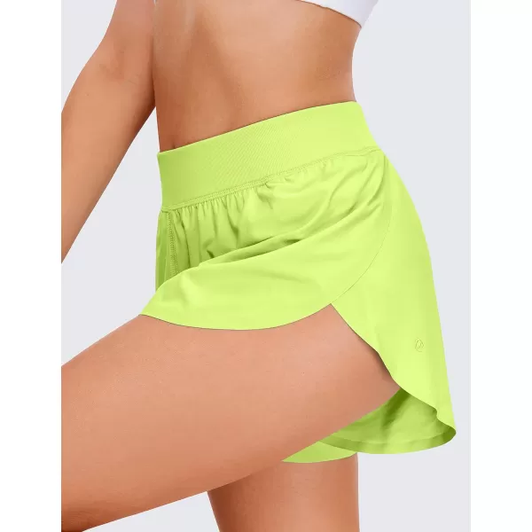 CRZ YOGA Mid Waisted Dolphin Athletic Shorts for Women Lightweight High Split Gym Workout Shorts with Liner Quick DryNeon Yellow