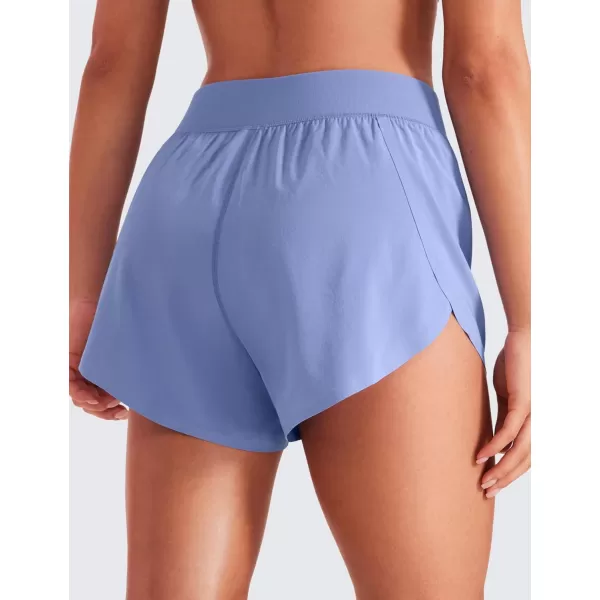 CRZ YOGA Mid Waisted Dolphin Athletic Shorts for Women Lightweight High Split Gym Workout Shorts with Liner Quick DryPeriwinkle Purple