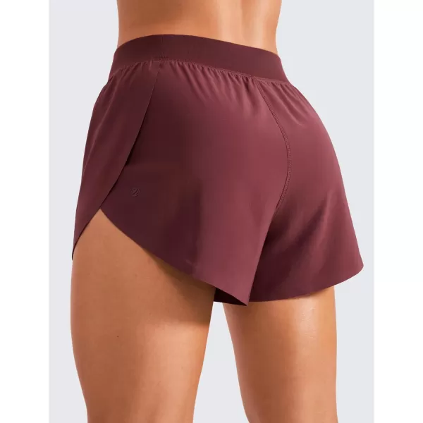 CRZ YOGA Mid Waisted Dolphin Athletic Shorts for Women Lightweight High Split Gym Workout Shorts with Liner Quick DryRed Merlot